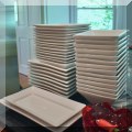 K11. White square plates and bowls. 